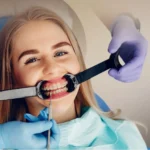 A woman undergoing a dental treatment