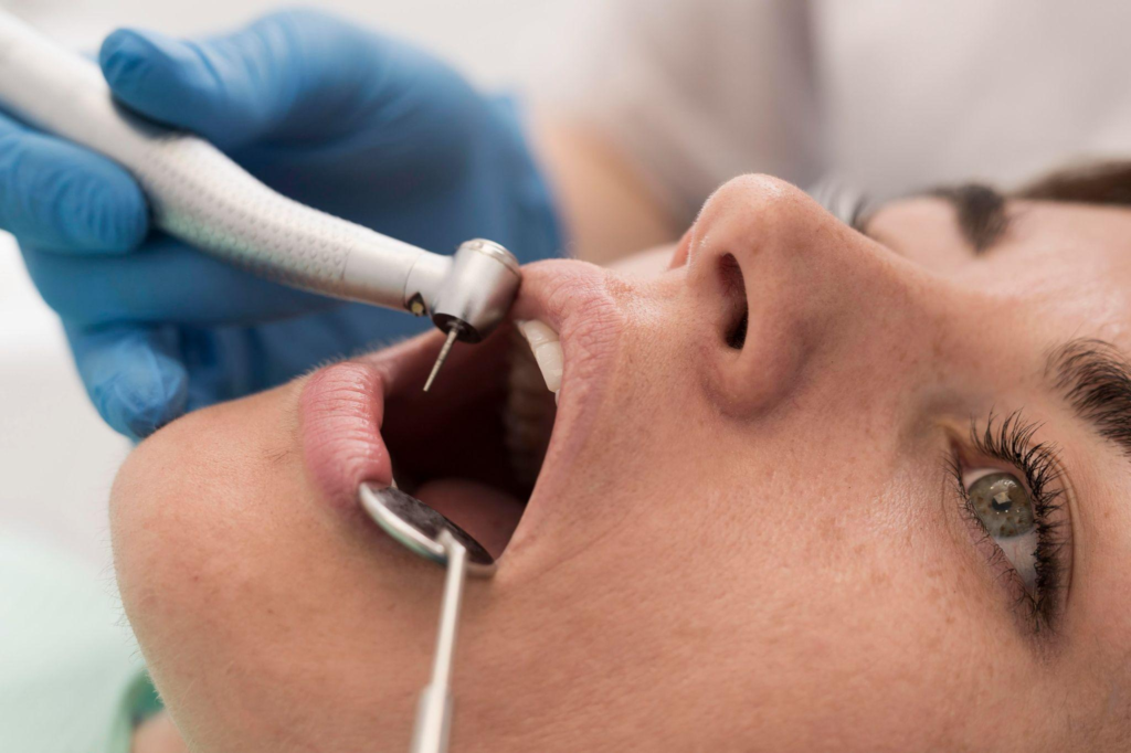 A dentist offering the dental filling treatment to a woman 