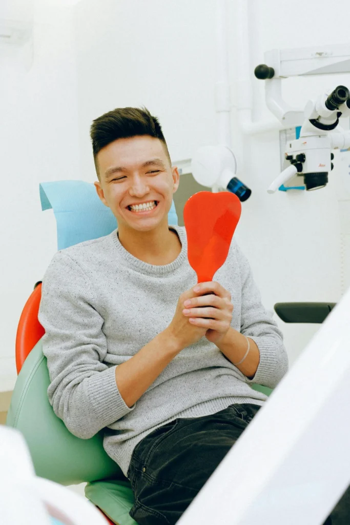 Dental teeth cleaning results in a healthy smile after a routine check-up in Dubai